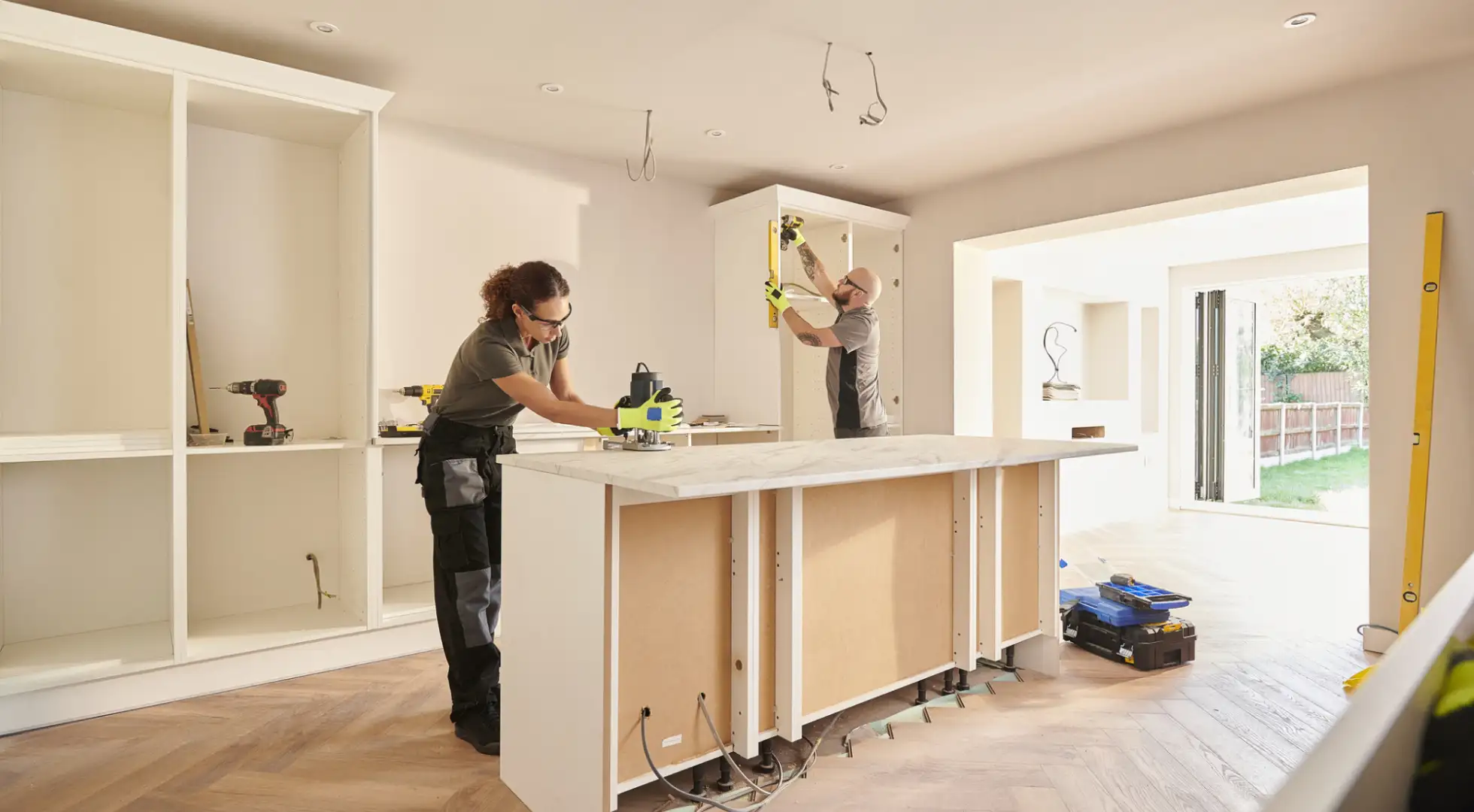 Workers completing a kitchen renovation