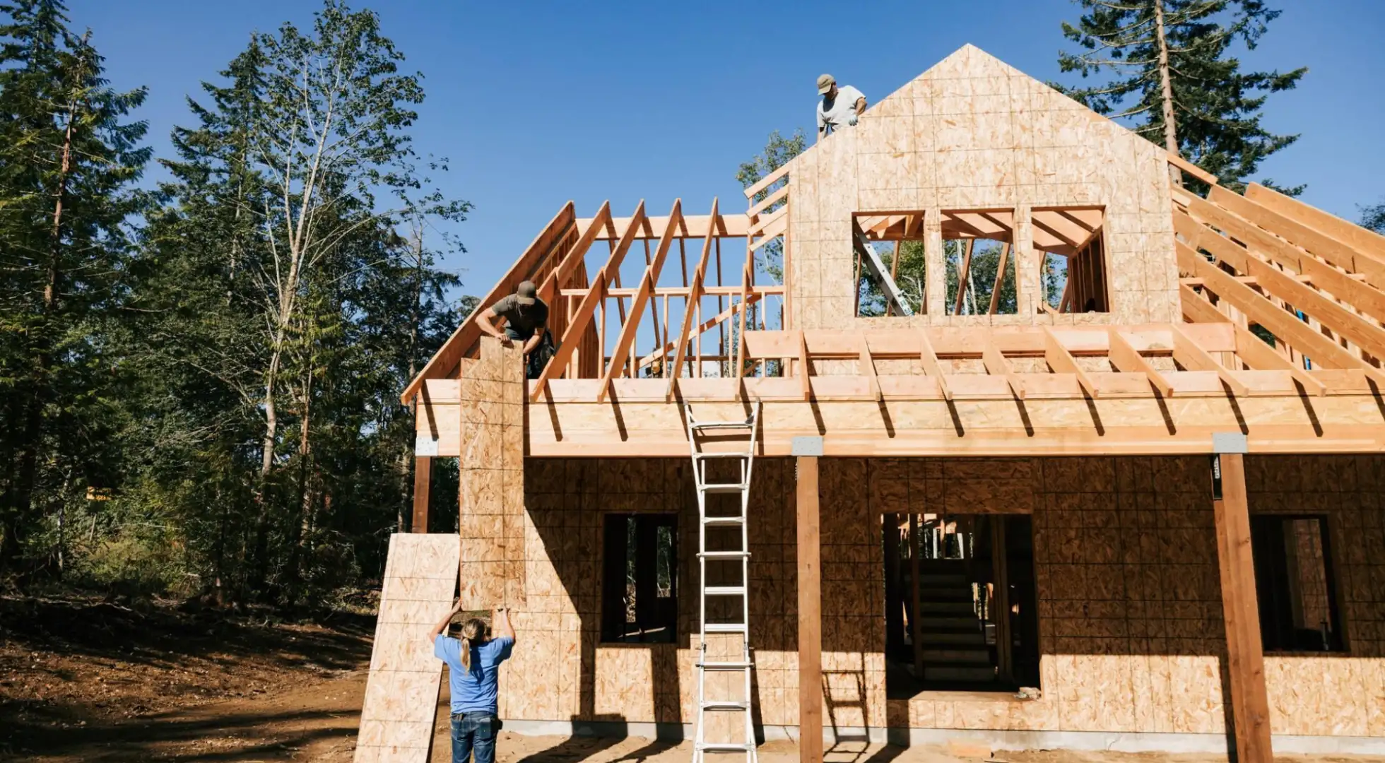 Buying Land and Building a House: Pipe Dream or Possible? Land where someone is building a house
