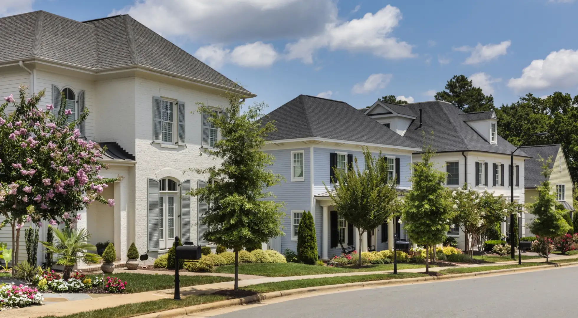 row of upscale homes in a suburban neighborhood: adjustable-rate mortgages