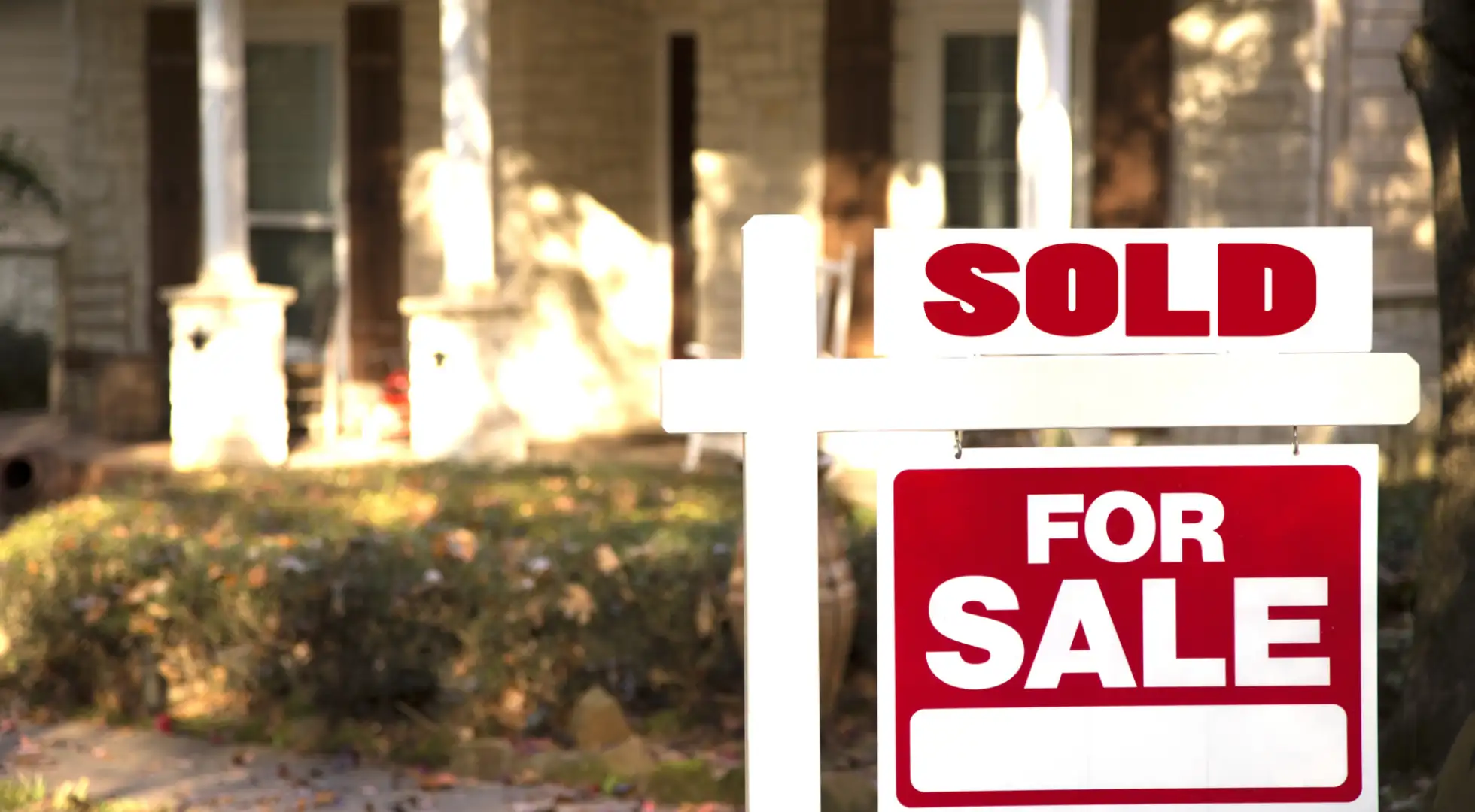 Home Sales Reached a 15-Year High in 2021, Even With December's Retreat house with sold sign