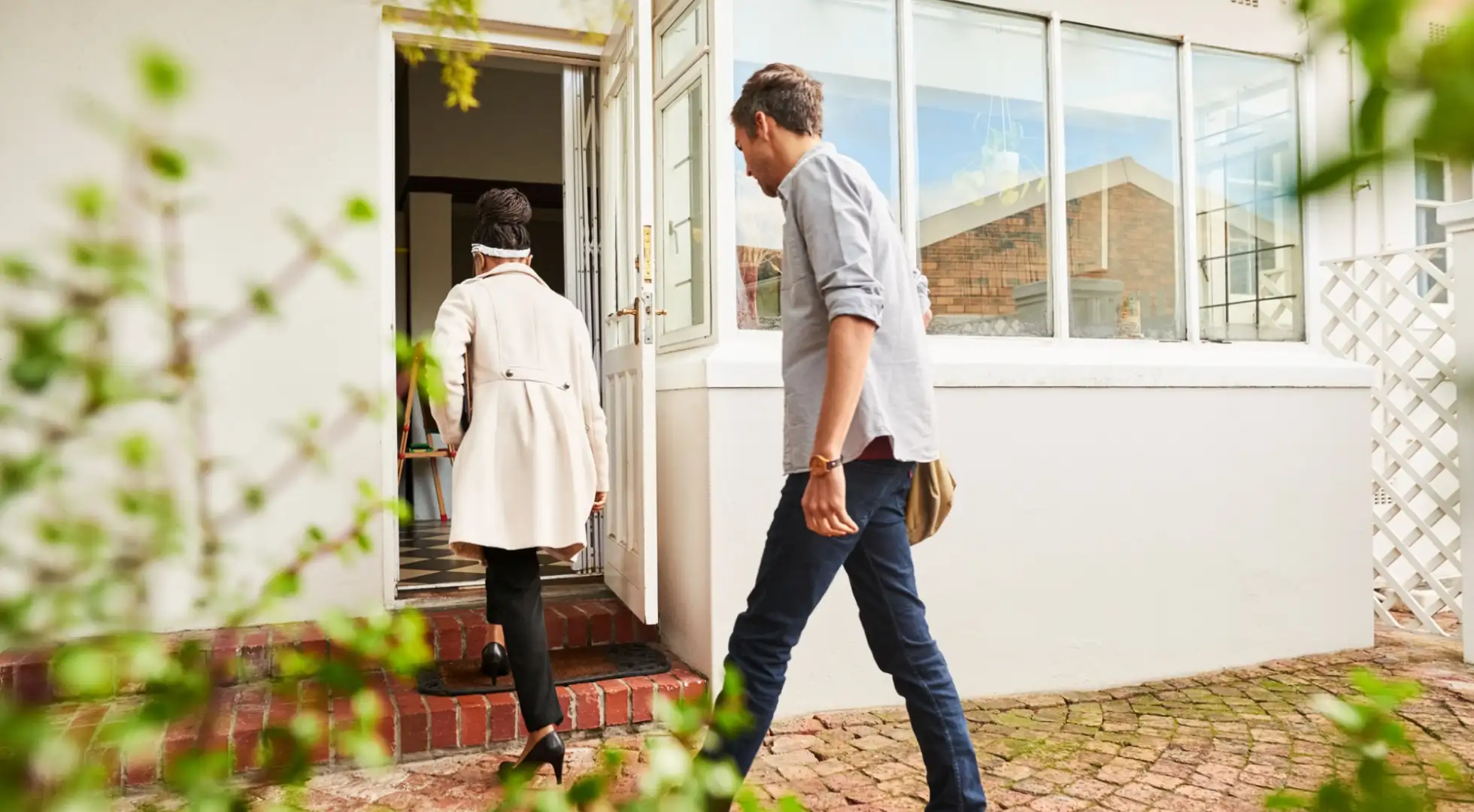 home shoppers entering property for sale