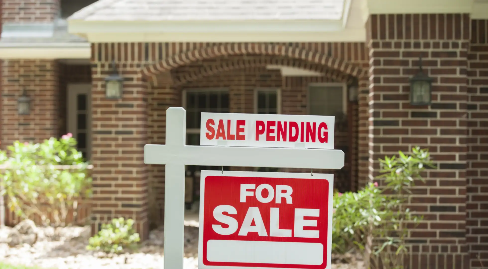 Pending Home Sales Drop to the Slowest Pace in Nearly a Decade, NAR Says sign saying pending sale