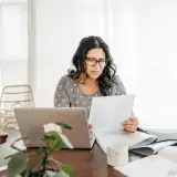 Woman reviewing property tax bill
