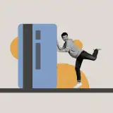 A man pushes a large credit card