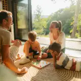 A family plays games in their home during springtime