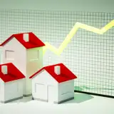 houses in front of mortgage rate graph