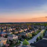 aerial view of neighborhood at sunset