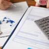 A co-signer reviews a loan.