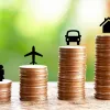 Stacks of coins with icons representing family, travel, car, and house, showing financial priorities.