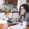 Homeowner looking at computer