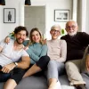 Parents with adult children in a living room