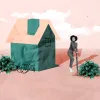 A woman standing in front of a paper house with umbrella.