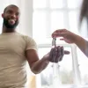 A first time homebuyer receiving keys.