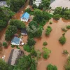 An aerial view of flooded homes.