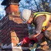 Man repairing chimney