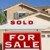 Home with for sale sign: national housing emergency