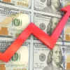 inflation chart rising in front of U.S. currency