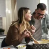 First-time homebuyer couple in their kitchen.