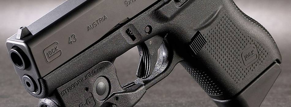 Glock 43 pistol with streamlight tlr 6 light