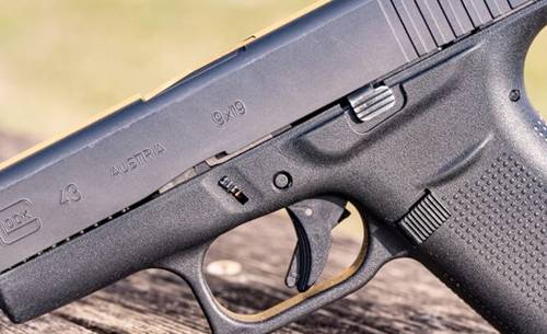 Glock 43 picture on a green background