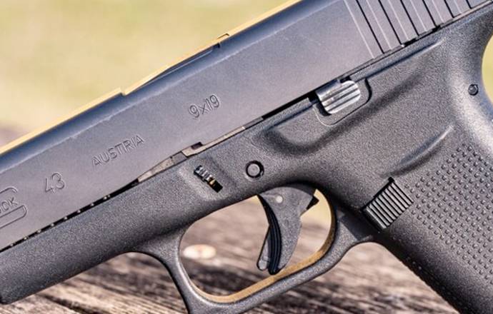 Glock 43 picture on a green background