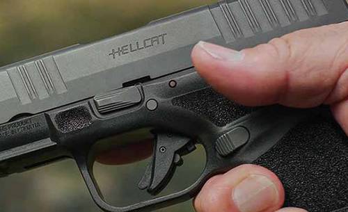 A springfield Armory Hellcat pistol in hands