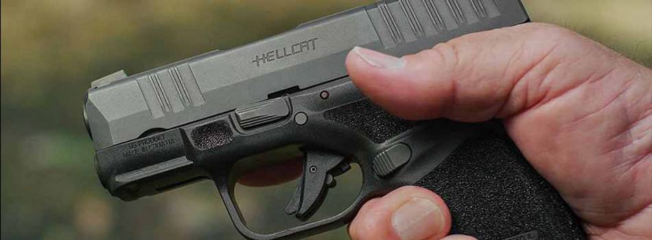 A springfield Armory Hellcat pistol in hands