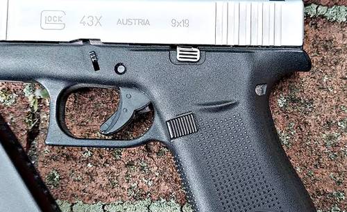 Glock 43x and a magazine and the best holsters