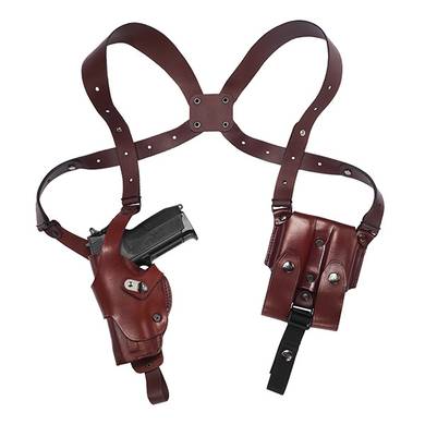 Vertical roto shoulder holster for left handed shooter