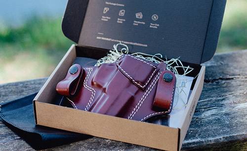 A neat custom leather holster for Taurus G2c in a box