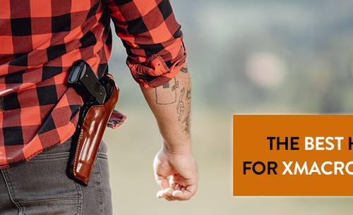 a guy in a flannel shirt with a custom leather holster and a semi automatic pistol