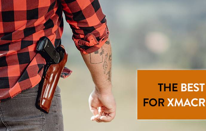 a guy in a flannel shirt with a custom leather holster and a semi automatic pistol