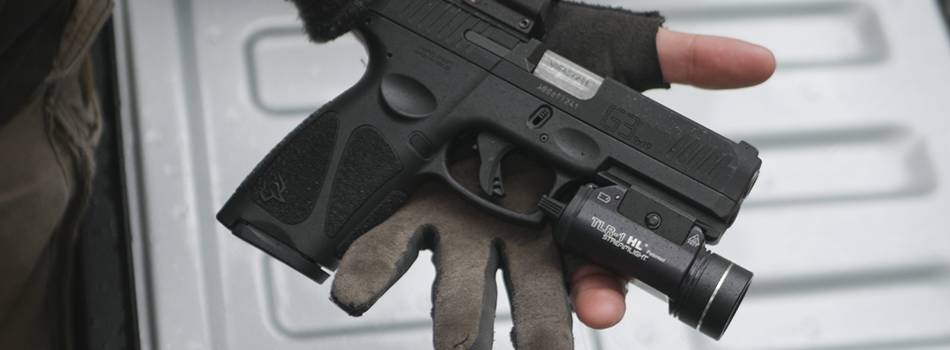 Taurus G3c pistol with a tactical light mounted to its rail