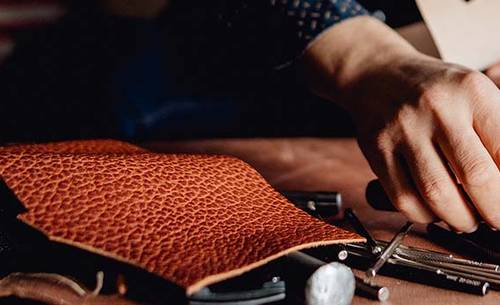 a craftsman reaching for his tools