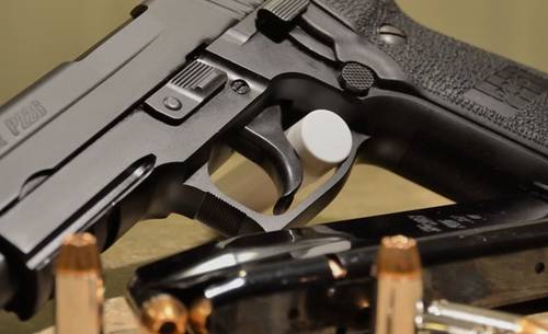 SIG Sauer P226 pistol with ammo