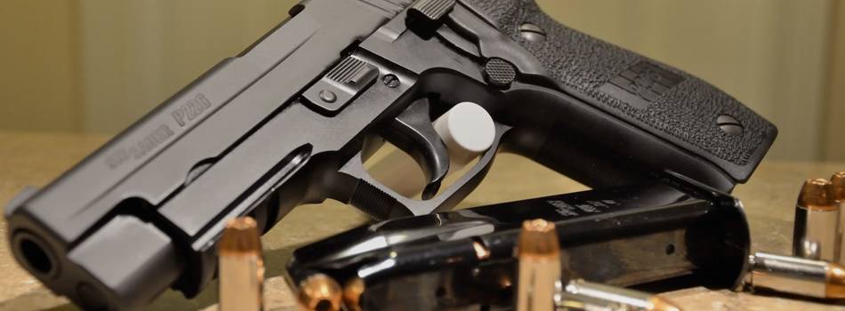 SIG Sauer P226 pistol with ammo