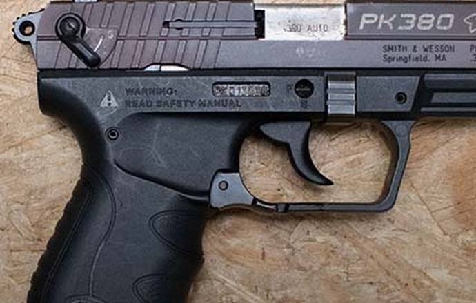 Walther PK380 review - title picture showing Walther PK380 on a wooden backround