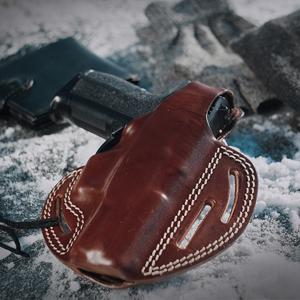 Cross draw concealed carry holster with 2 positions