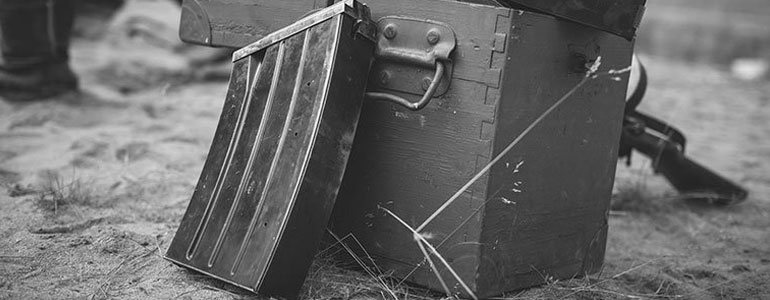 Close up on a magazine crate and a magazine