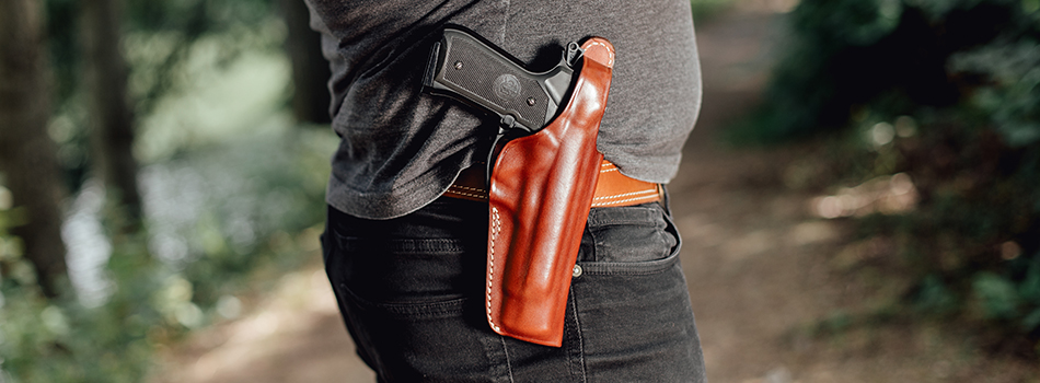 Beretta 92FS in an outside the waistband holster