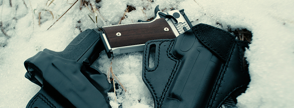 1911 handguns in OWB holsters