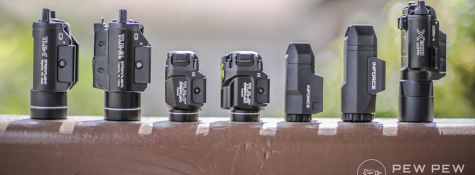 a collection of tactical lights for pistols