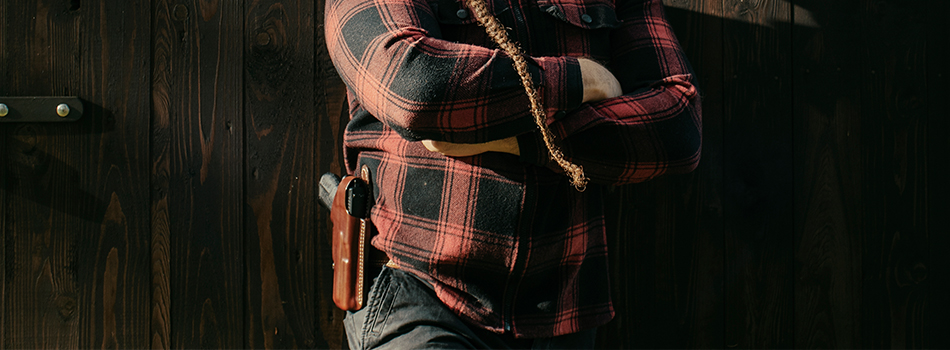 A guy with a Glock 19 in an outside the waistband holster