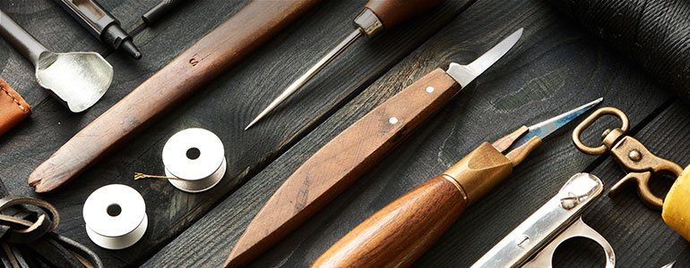 Close up on leather working tools