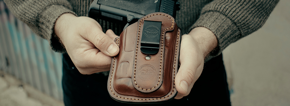 a guy showing his light bearing holster