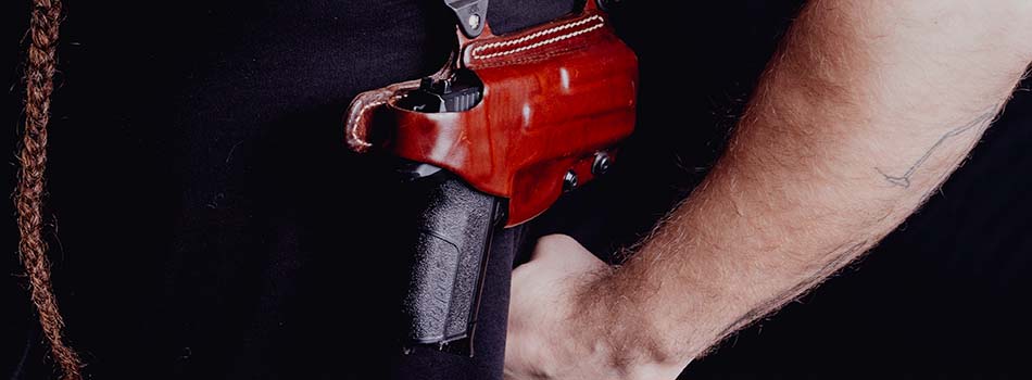 Single Action vs Double Action - picture showing double action pistol in shoulder holster