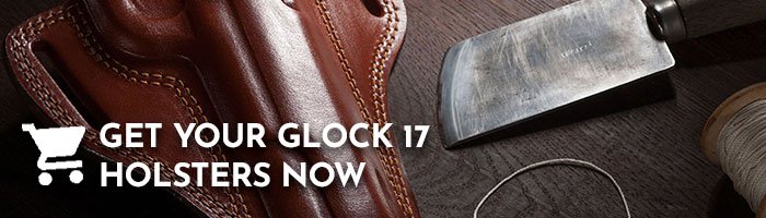 Leather holster lying on a wooden table next to a leather knife and thread.