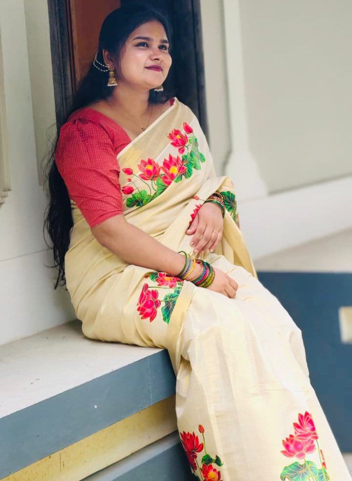 Thamara – The Timeless Bloom Printed Tissue Kerala Saree