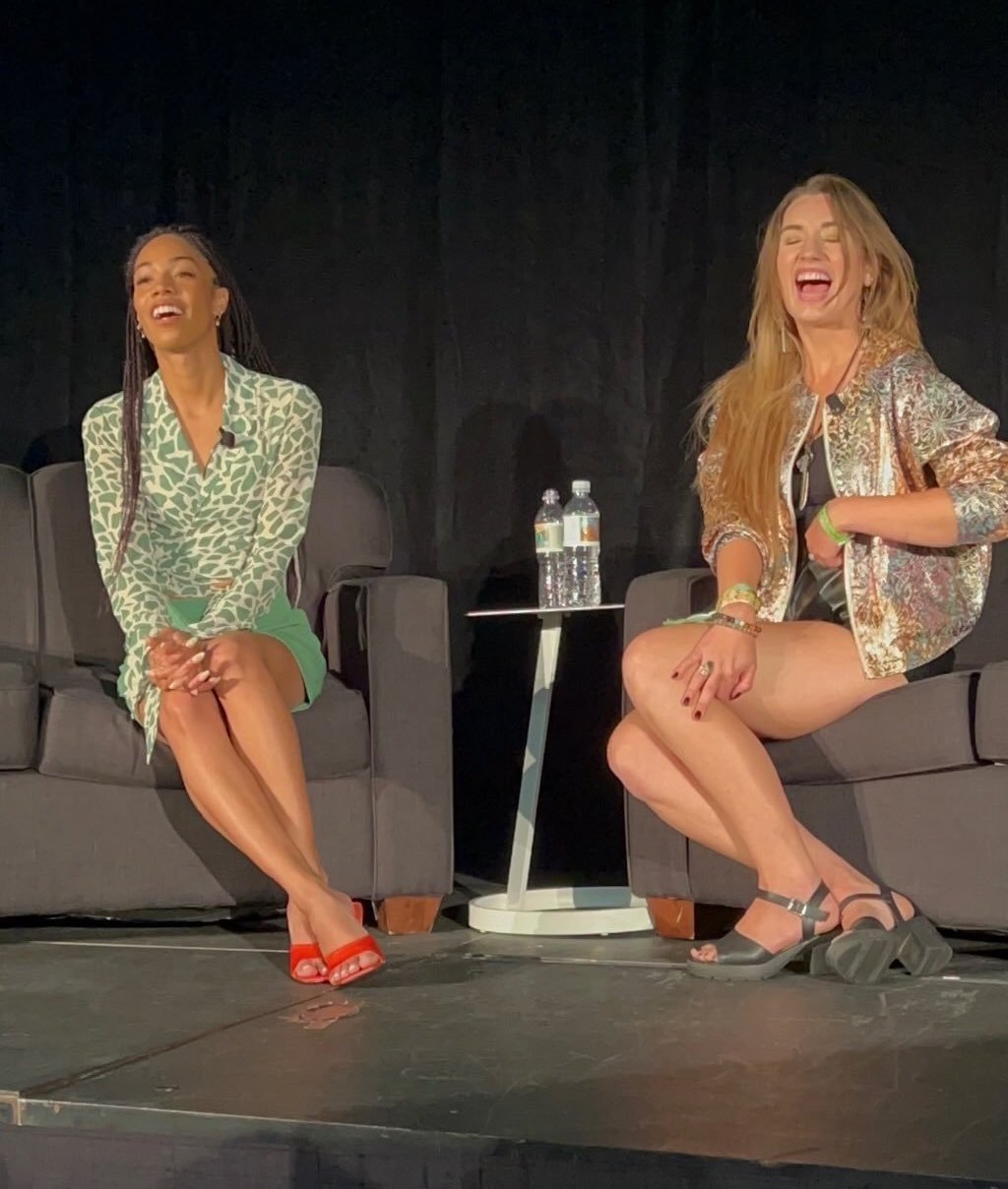 Kaya and Crystal sit on stage as the answer questions after their talk at VidCon 2022