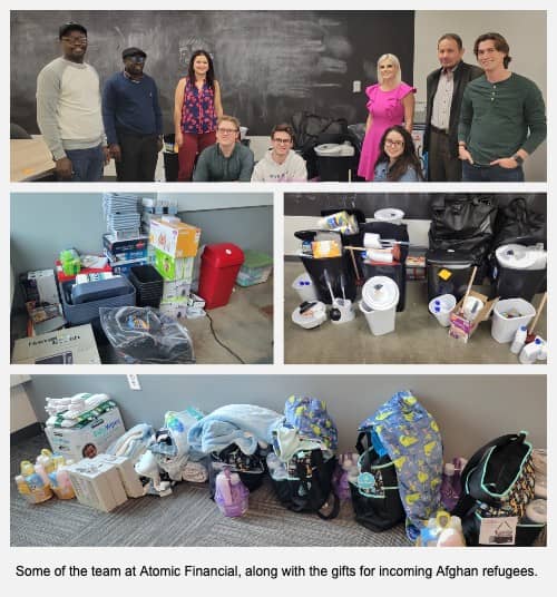 Some of the team at Atomic Financial, along with the gifts for incoming Afghan refugees. 